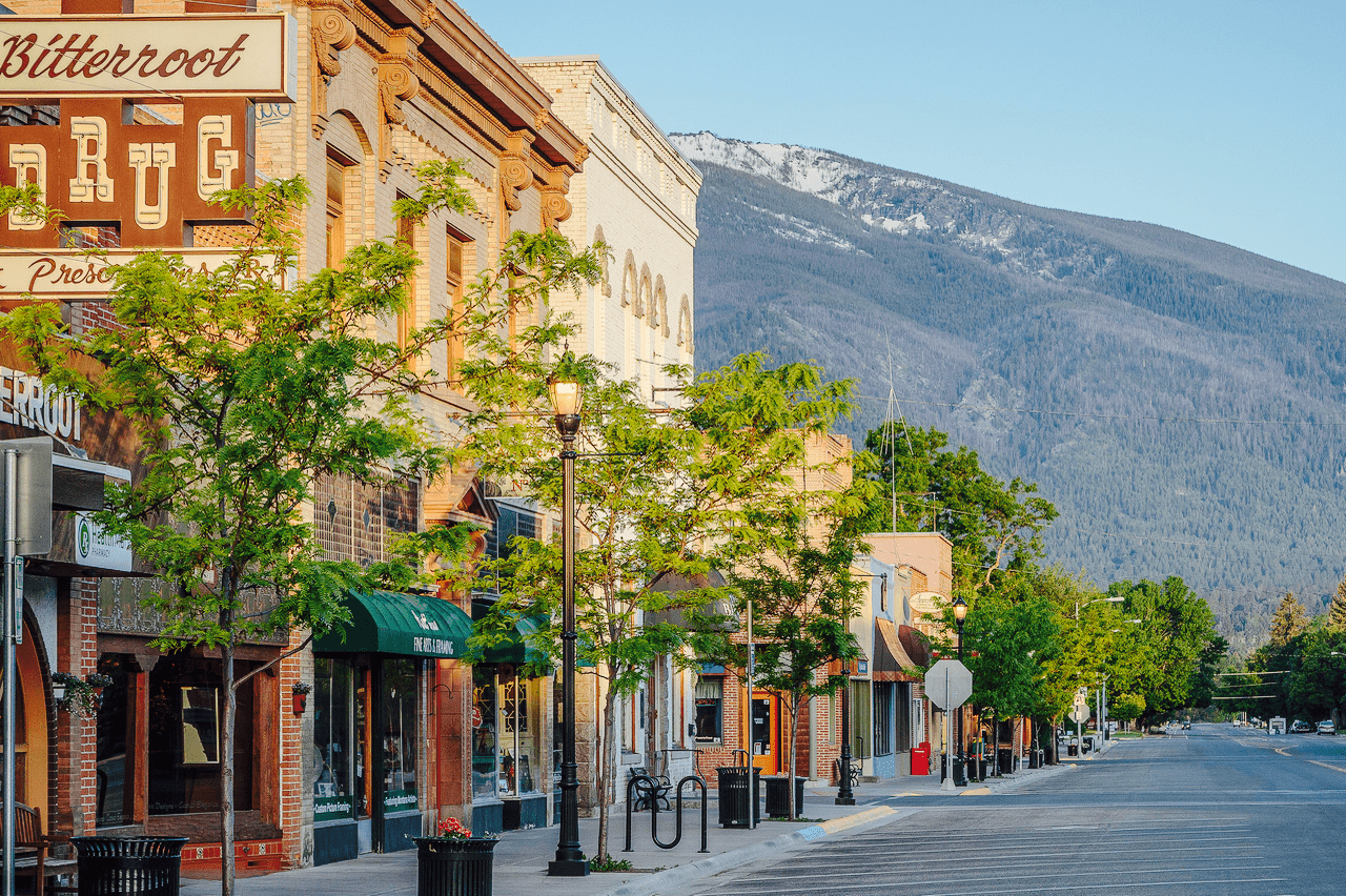 Mainstreet with shops set against mountain backdrop in the Bitterroot Valley Montana