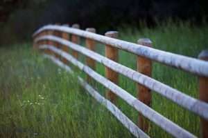 Fence boundary of a Montana ranch for sale
