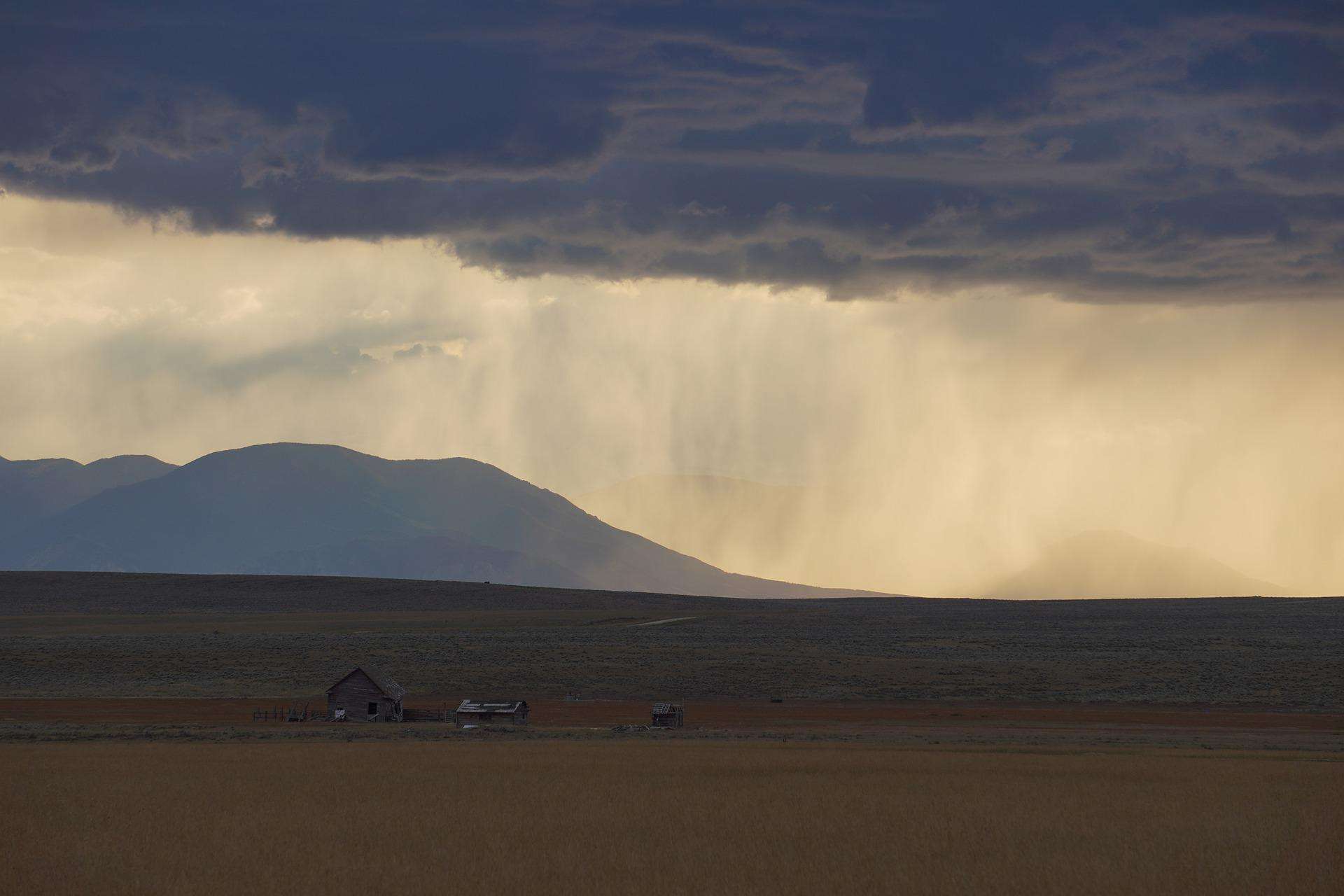 Clouds and rain over a ranchland in Montana
